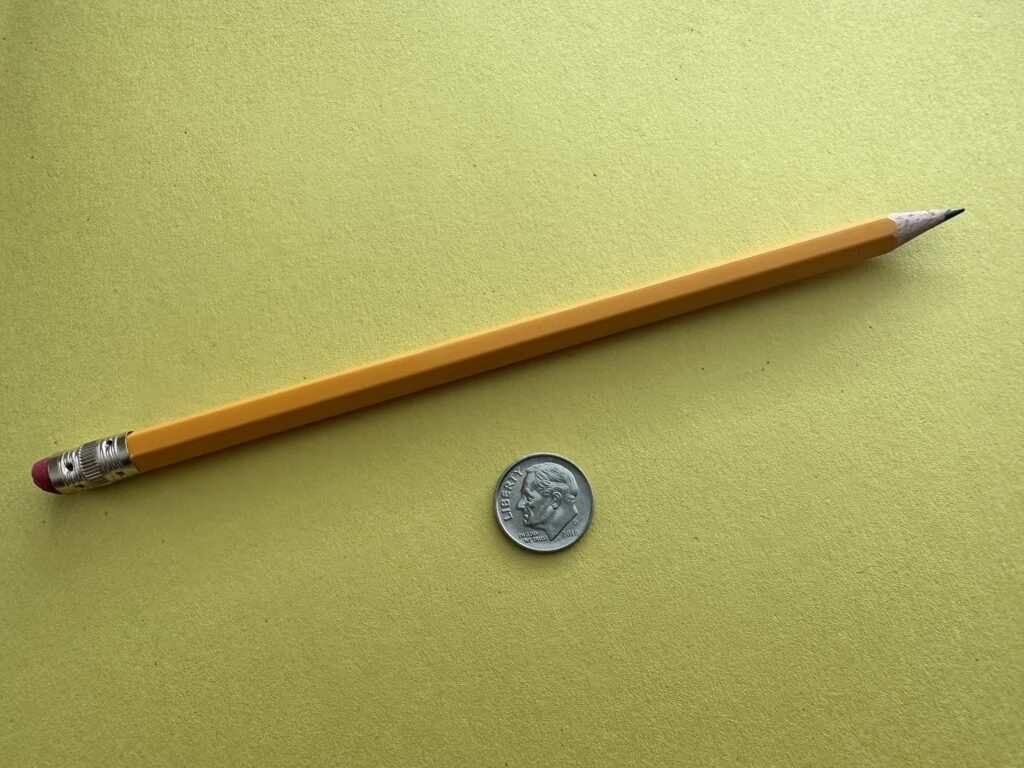 Pencil and dime